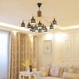 Moderne Og Samtidskunstnerisk Lysekrone I Stål Med 15 Lys Og Stålskjerm