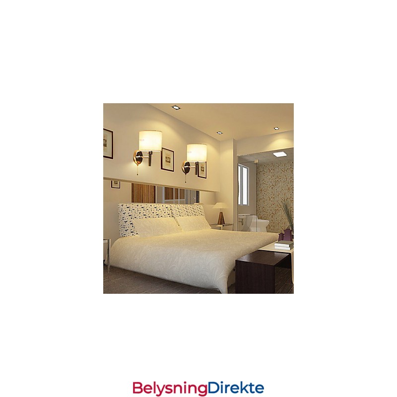 Stilig Vegglampe I Metall Og Stoff Med 1 Lyskilde I Hvit Sylinder