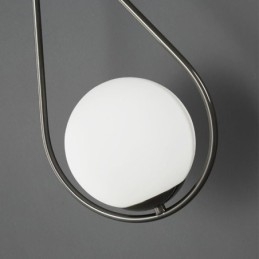 Moderne Globeformet Vegglampe I Glass Med Svart Vanndråpeform