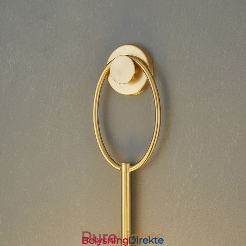 Moderne Globeformet Vegglampe I Børstet Gullfarget Glass